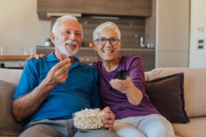seniors enjoying vseebox and tv entertainment